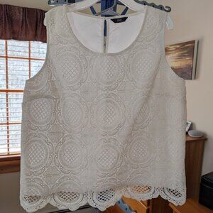 Embroidered white sleeveless blouse